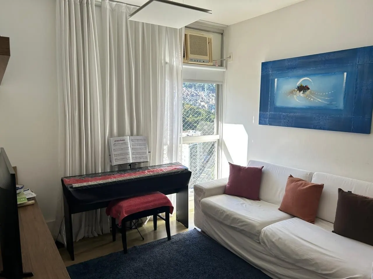Quarto com vista e ambiente de música