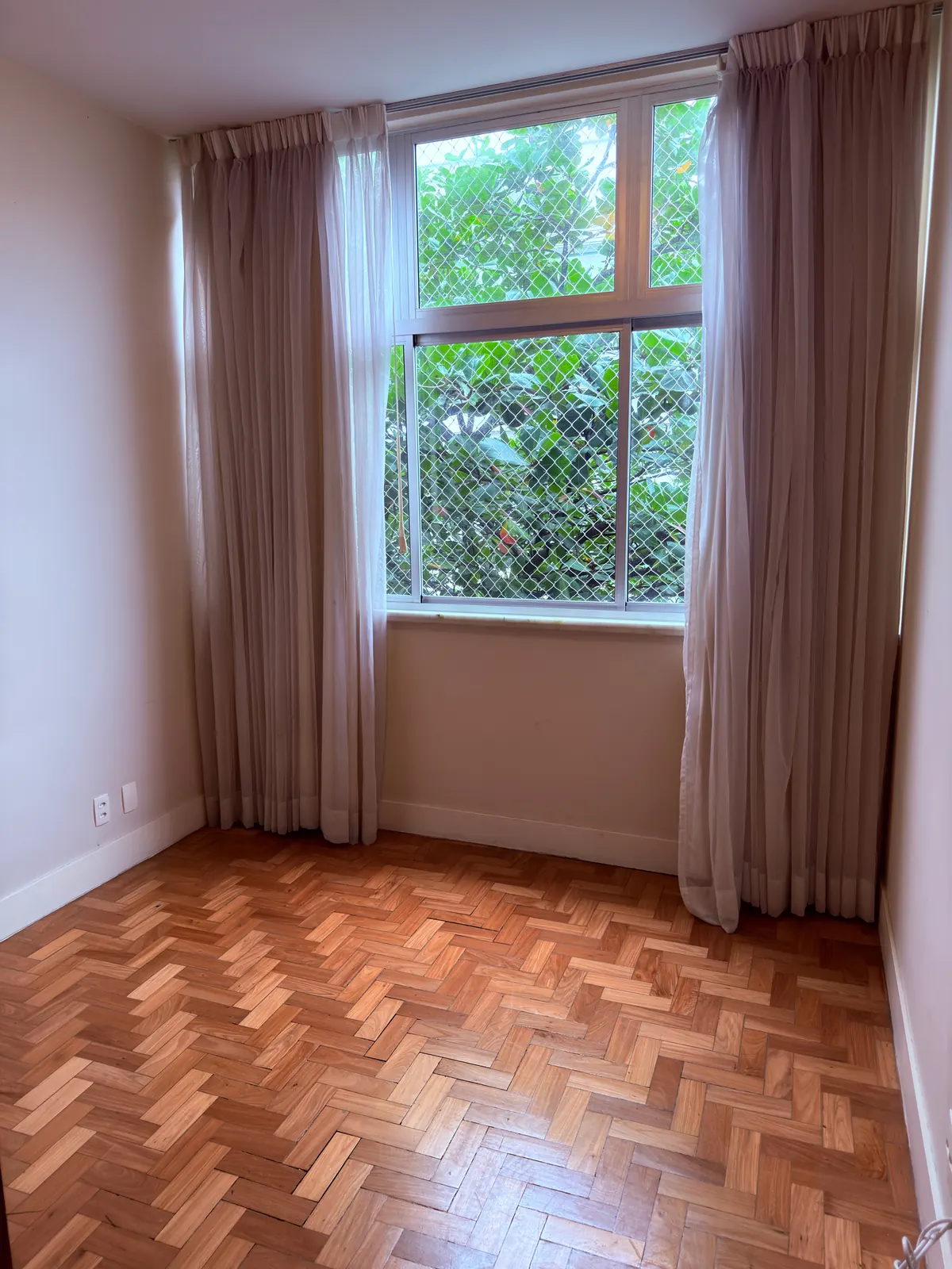 Quarto com vista para o verde